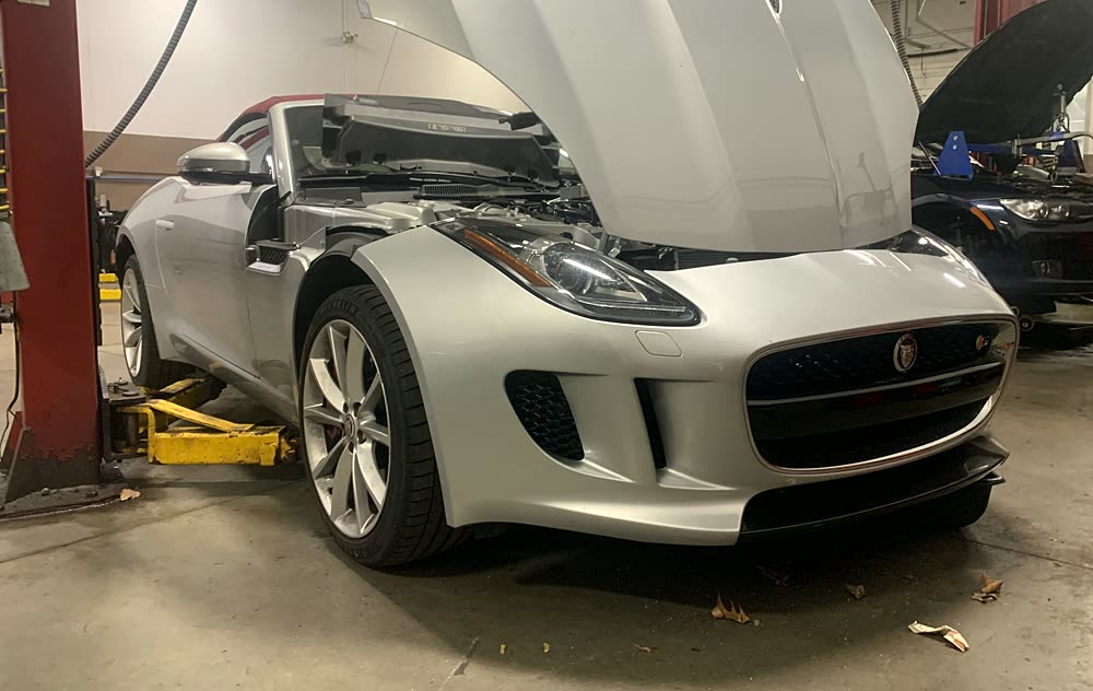 Vehicle service work inside Nelson's Automotive shop
